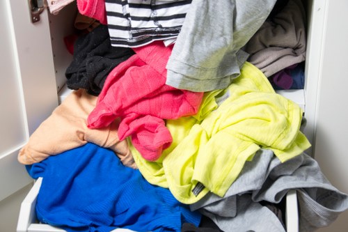 Recycling bins and separated materials ready for transfer to local stations