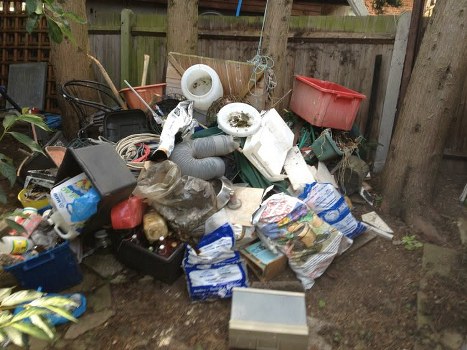 Professional garage clearance team at work